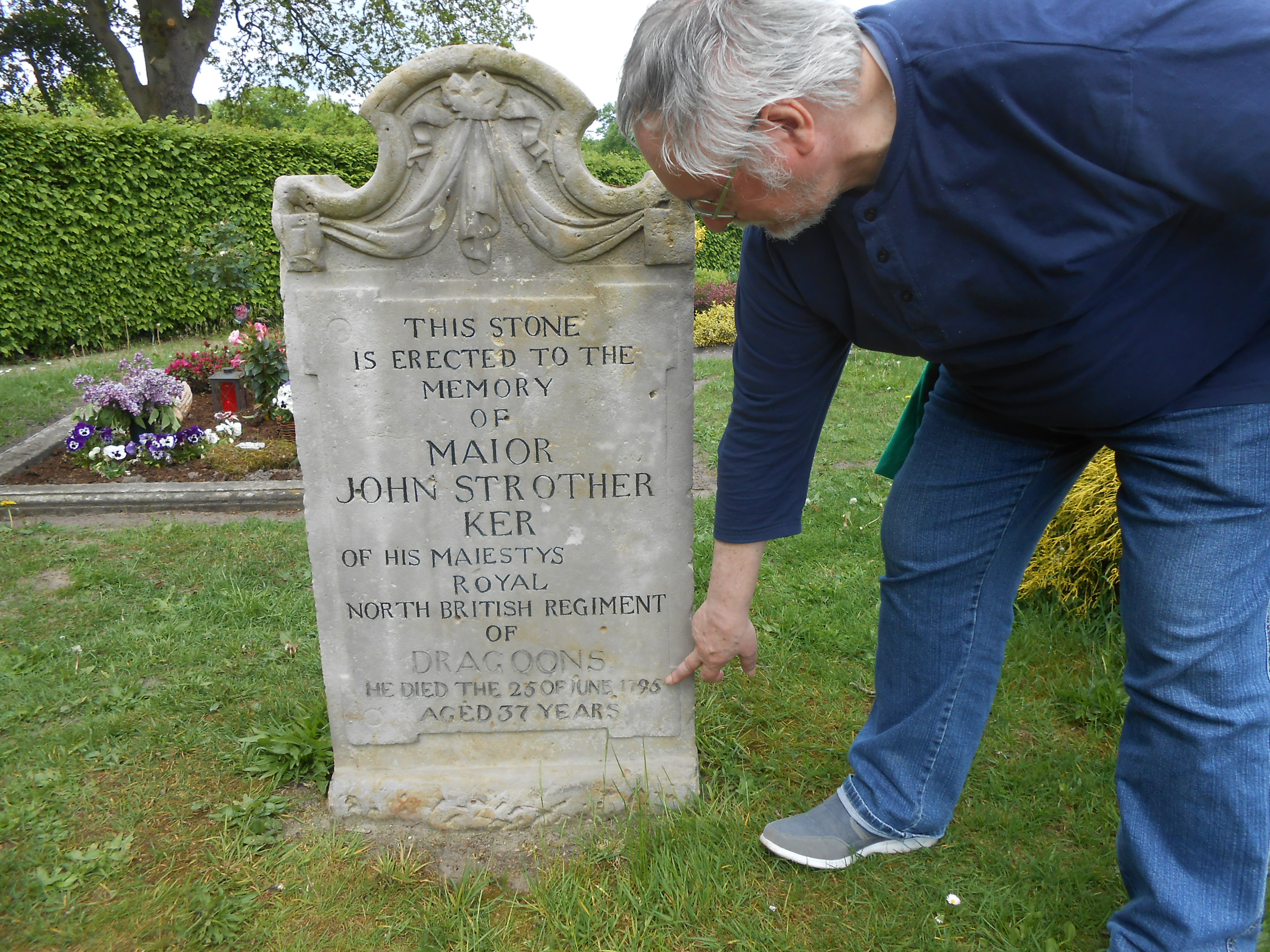 THIS STONE IS ERECTED TO THE MEMORY OF MAIOR JOHN STROTHER KER OF HIS MAIESTYS ROYAL NORTH BRITISH REGIMENT OF DRAGOONS. HE DIED THE 25. OF JUNE 1795, AGED 37 YEARS.